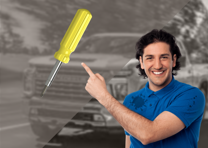 man pointing on screwdriver